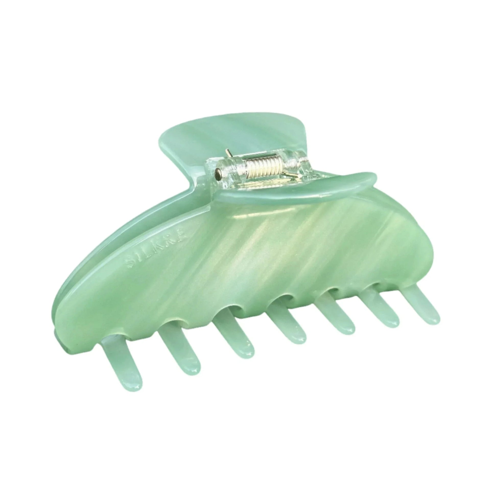 large claw clip designed for thin hair in a jade green colour 