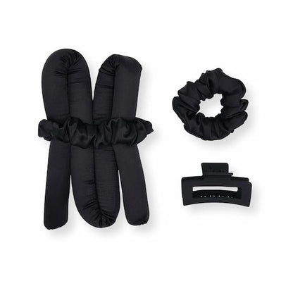 heatless curls set in black with black scrunchie and black claw clip
