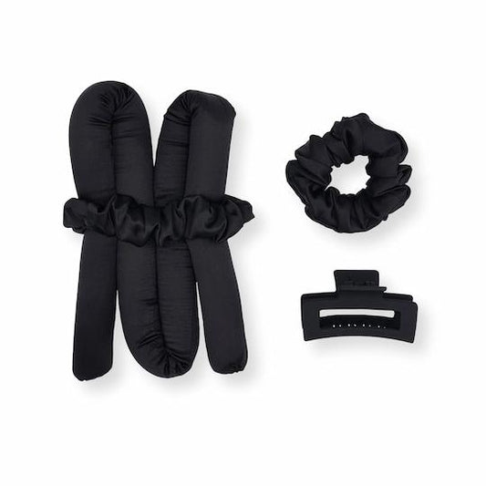 heatless curls set in black with black scrunchie and black claw clip