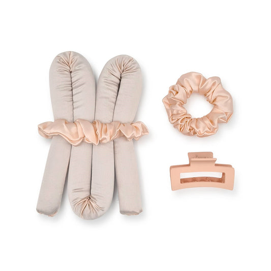heatless curls set in pink with pink scrunchie and pink claw clip