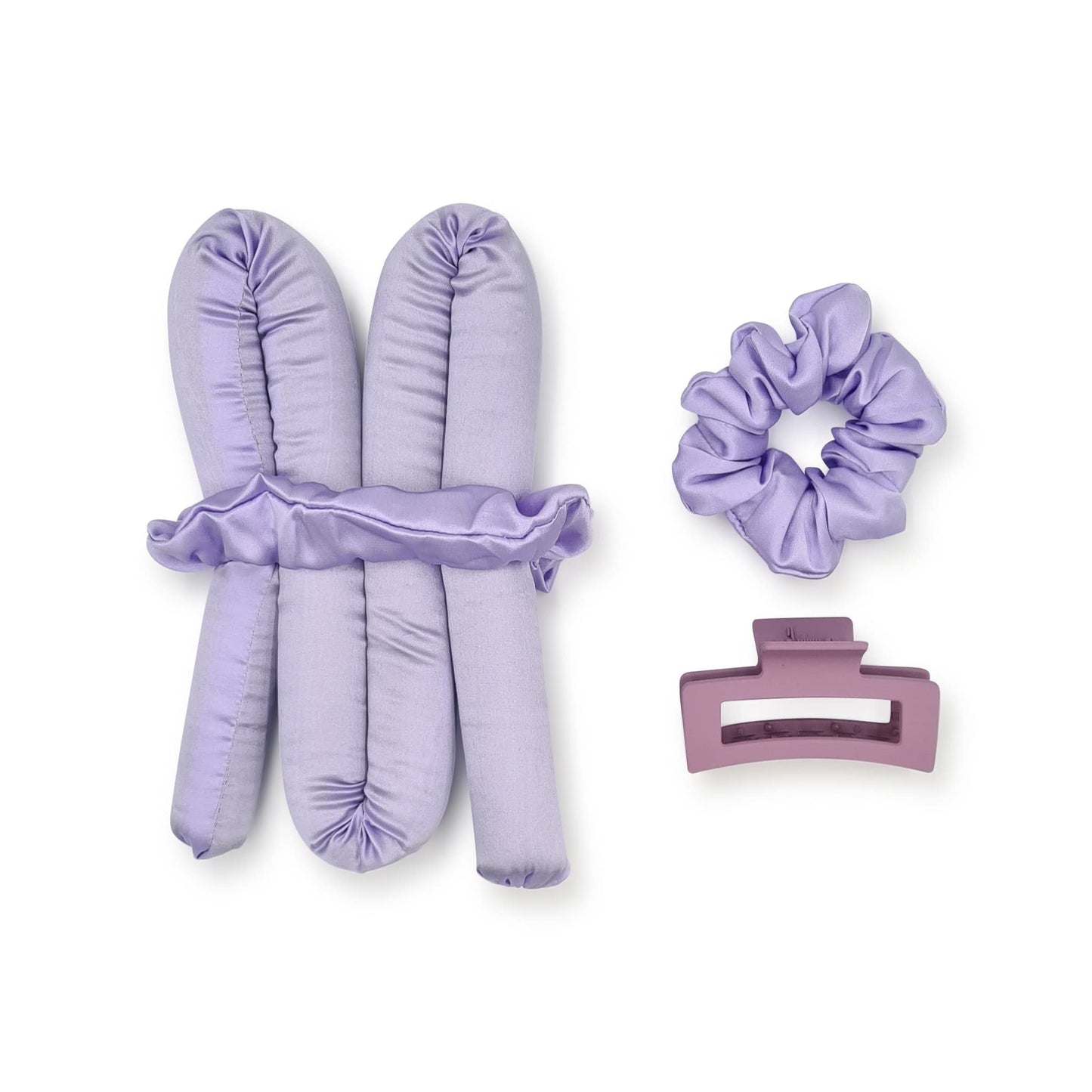 heatless curls set in purple with purple scrunchie and purple claw clip