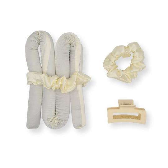 heatless curls set in white with white scrunchie and white claw clip
